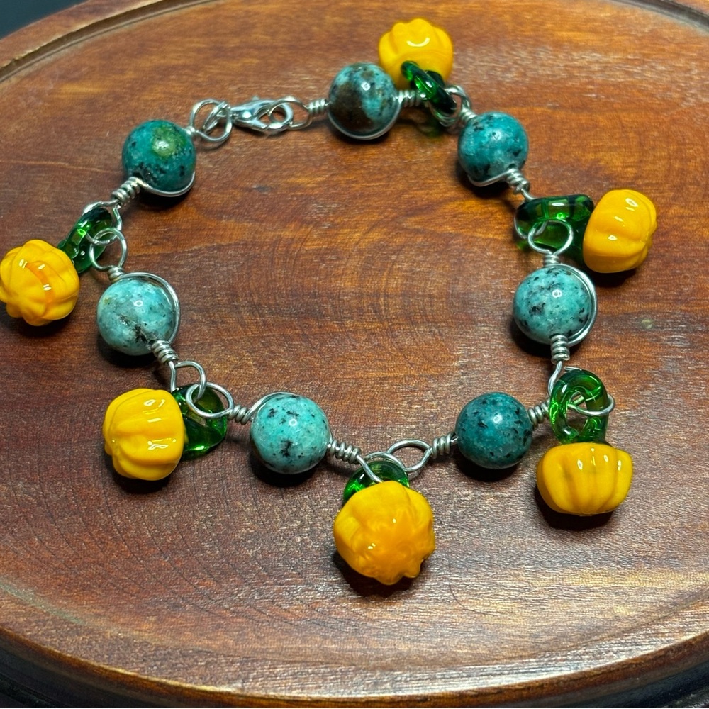 Pumpkin beaded bracelet, artisan handmade silver tone wire links.